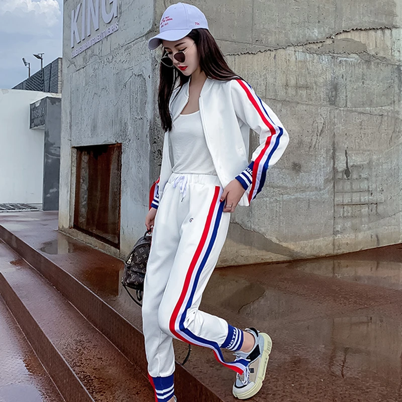 Женский спортивный костюм из двух предметов модельный брючный в полоску куртка