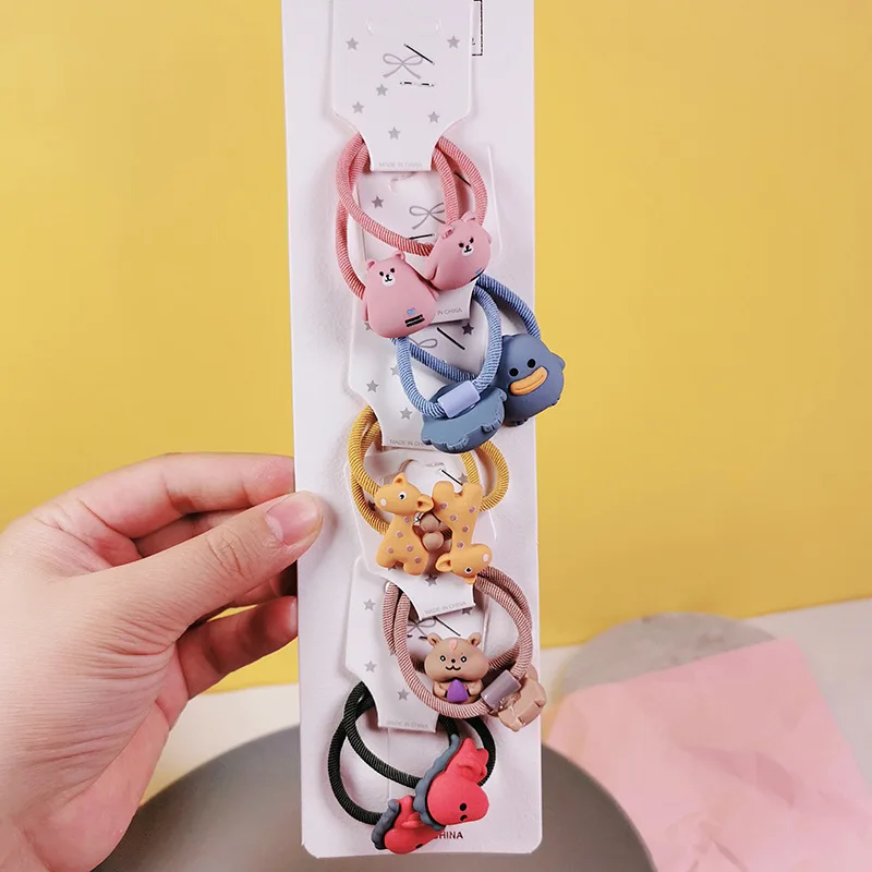 10 шт. Мультяшные резиновые повязки для волос различных цветов и дизайнов