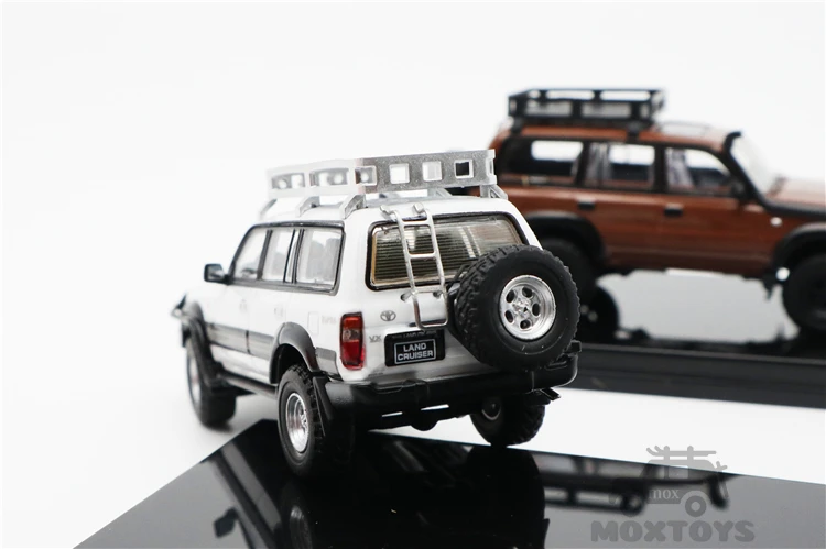 Модель автомобиля под давлением GCD 1:64 Toyota Land Cruiser LC80 красный/коричневый/белый |