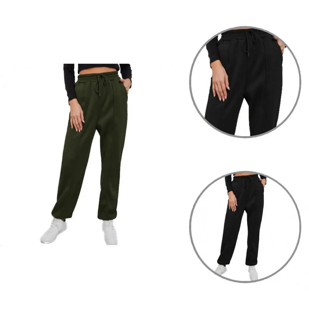 

Спортивные женские брюки с эластичным поясом и карманами