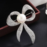 high quality metal bowknot brooch pins with man made pearl fashion elegant luxury zirconia bow brooche for women girls gift
