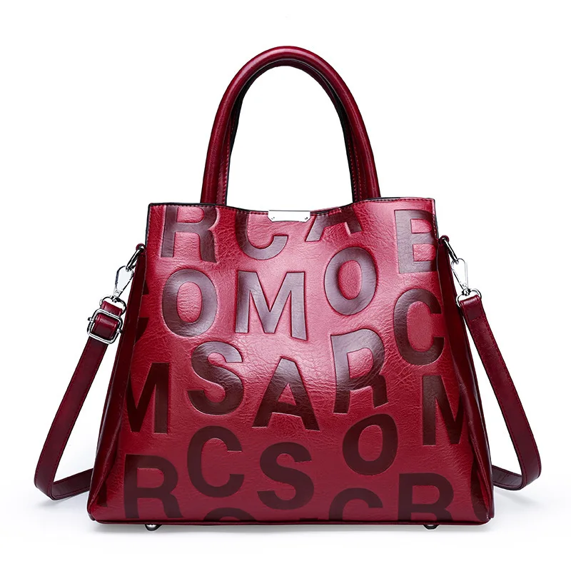 

Luxury women's bags spring 2021 new retro small square bag trend indentation letter handbag trend shoulder messenger bag