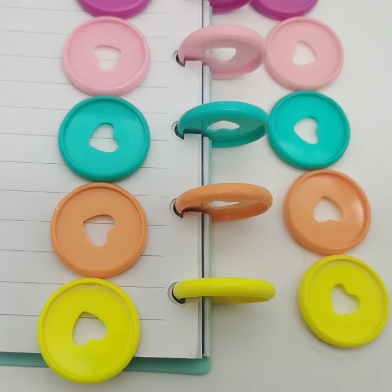 Рисунок 2 - Переплетные кольца с отверстиями в виде грибов