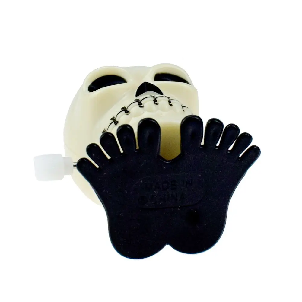 

2pcs/lot New Clockwork Jumping Skull Wind Up Bounce Toy Props Toy Party Halloween Gift