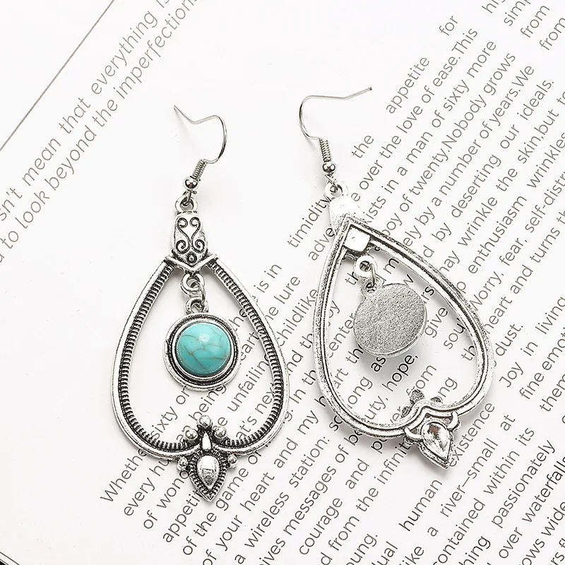 

Palace style water drop hollow turquoise earrings retro ethnic style individual earrings earrings