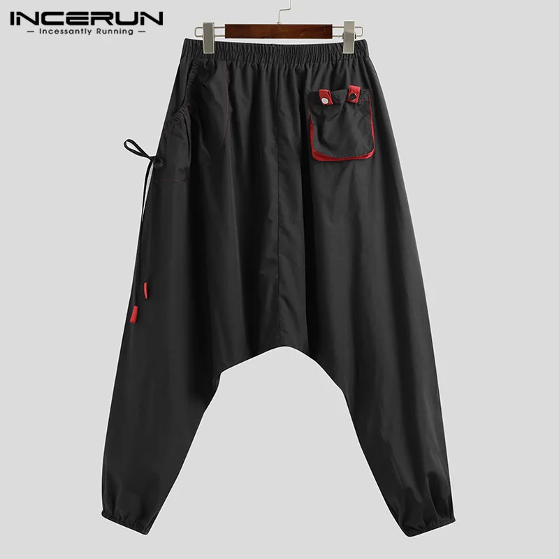 

INCERUN Men Harem Pants Solid Color Joggers 2021 Streetwear Elastic Waist Pockets Drop Crotch Trousers Men Loose Fashion Pants