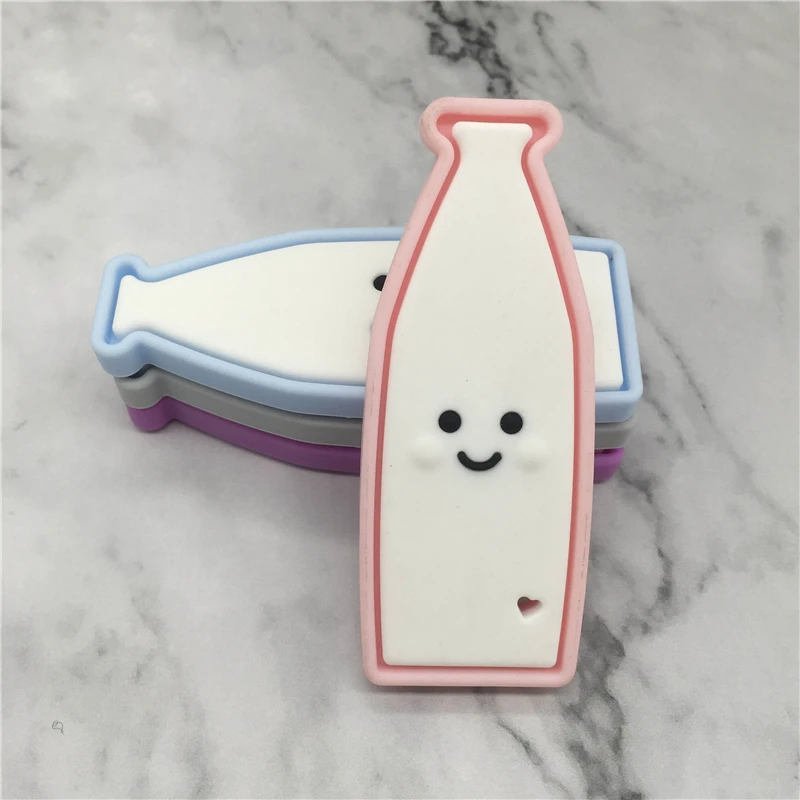 Детская игрушка-прорезыватель из силикона в виде бутылки с молоком Нетоксичная