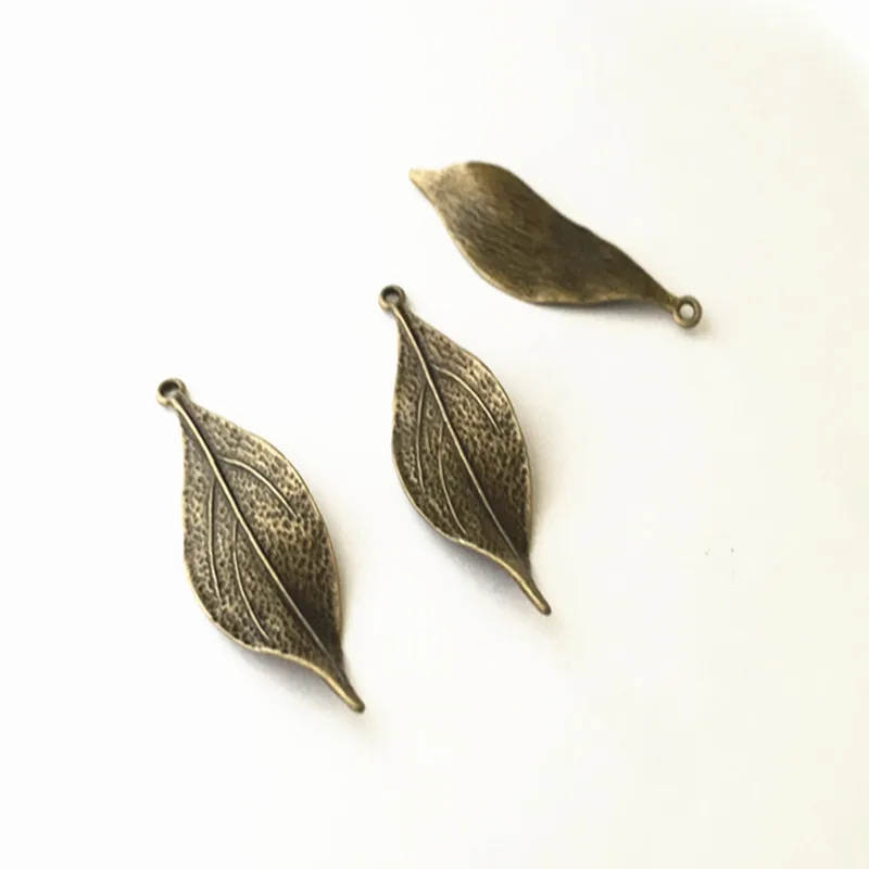 

15pcs/lot Antique bronze leaves Charms necklace pendant mini pendant connector Charms accessories 16mmx48mm