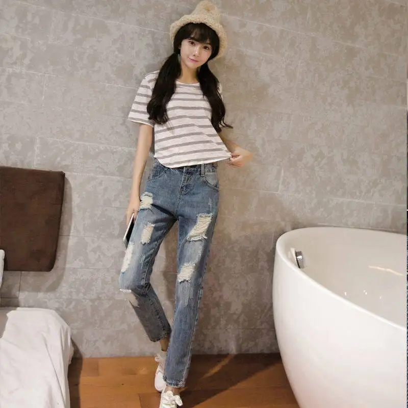 

2021 spring new Korean women's pants elastic waist Harlan ripped jeans nine points old pants casual pants women