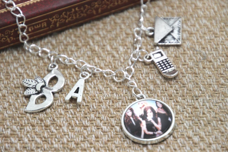 

12pcs/lot Pretty Little Liars Themed Statement Charm Necklace silver tone