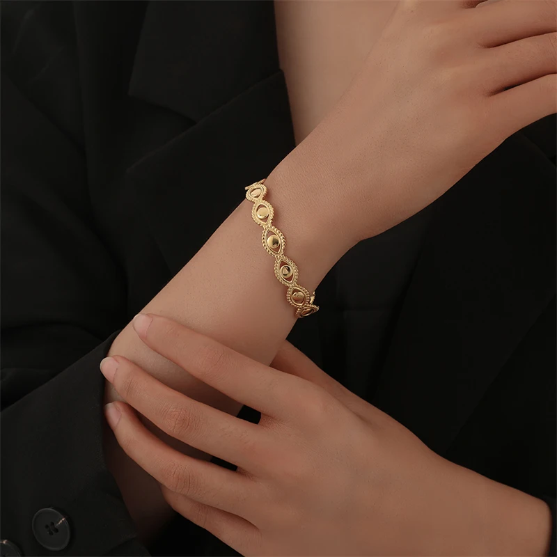

WeSparking EMO Stainless Steel Evil Eyes Bracelet Cuff Bangle For Women Gold Plated Year Trend Free Shipping Fashion Jewelry