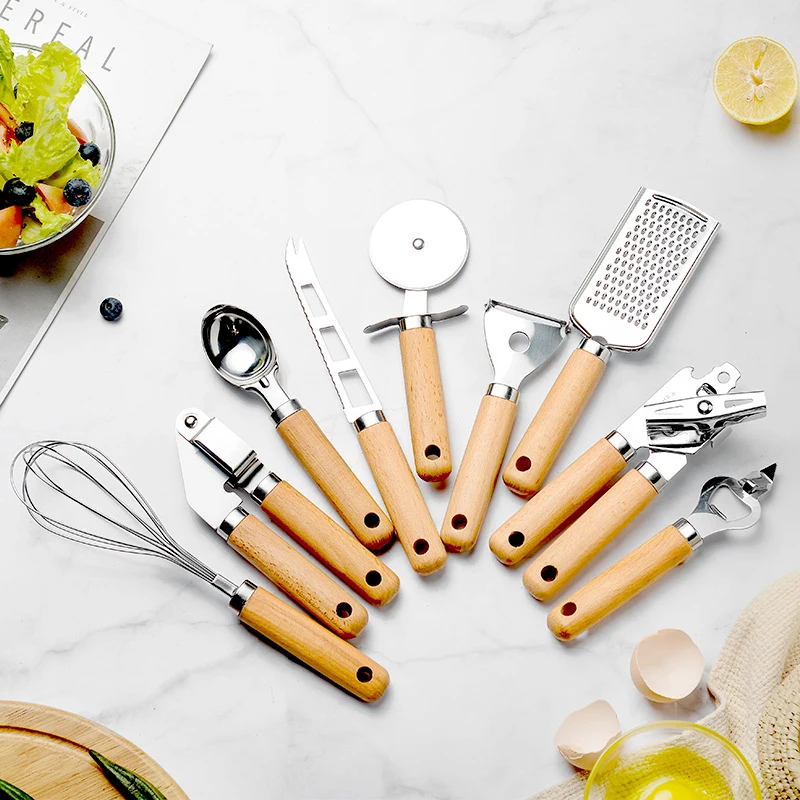 

9 pcs/set Stainless Steel Kitchen Tool Kit Wooden Handle Pizza Cutter Melon Ice Cream Scoop Whisk Peeler Can Opener Garlic Press