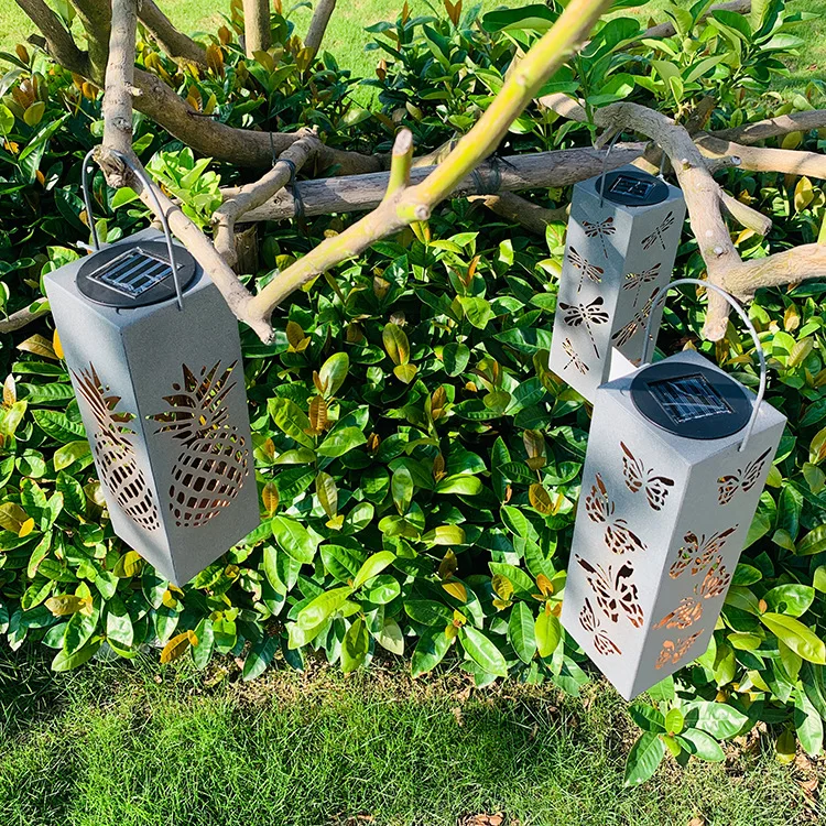 

LED solar pineapple, wrought iron lamp garden decoration atmosphere landscape lamp is hollow-out the projection lamp