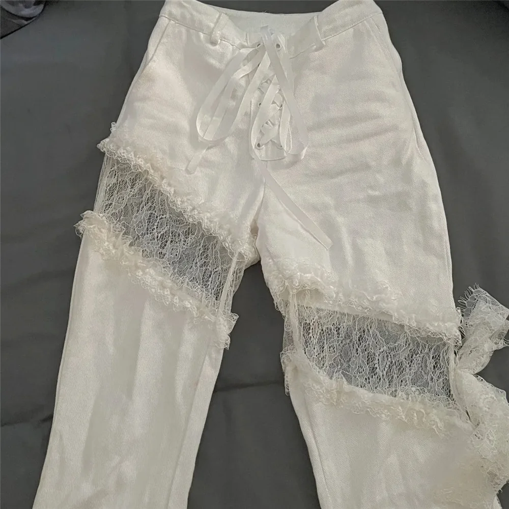 Джинсы-клеш Y2k с кружевом разрезами по бокам зауженные в готическом стиле уличные