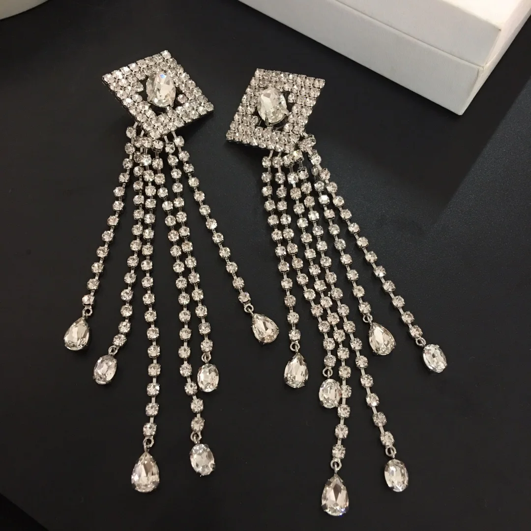 

Fashion personality new round water drop fringed crystal ear clip