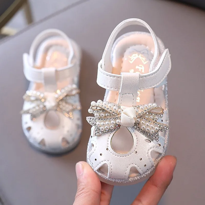 

Wholesale 0-3 year old baby sandals Baotou summer new children's princess shoes flat soft bottom little girl girls shoes