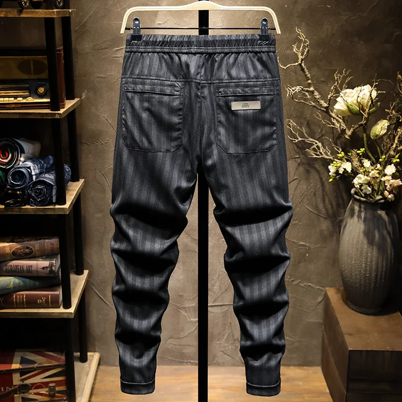 

2021 spring and summer striped elastic waistband men's casual pants elastic youth pants men's Korean fashion city