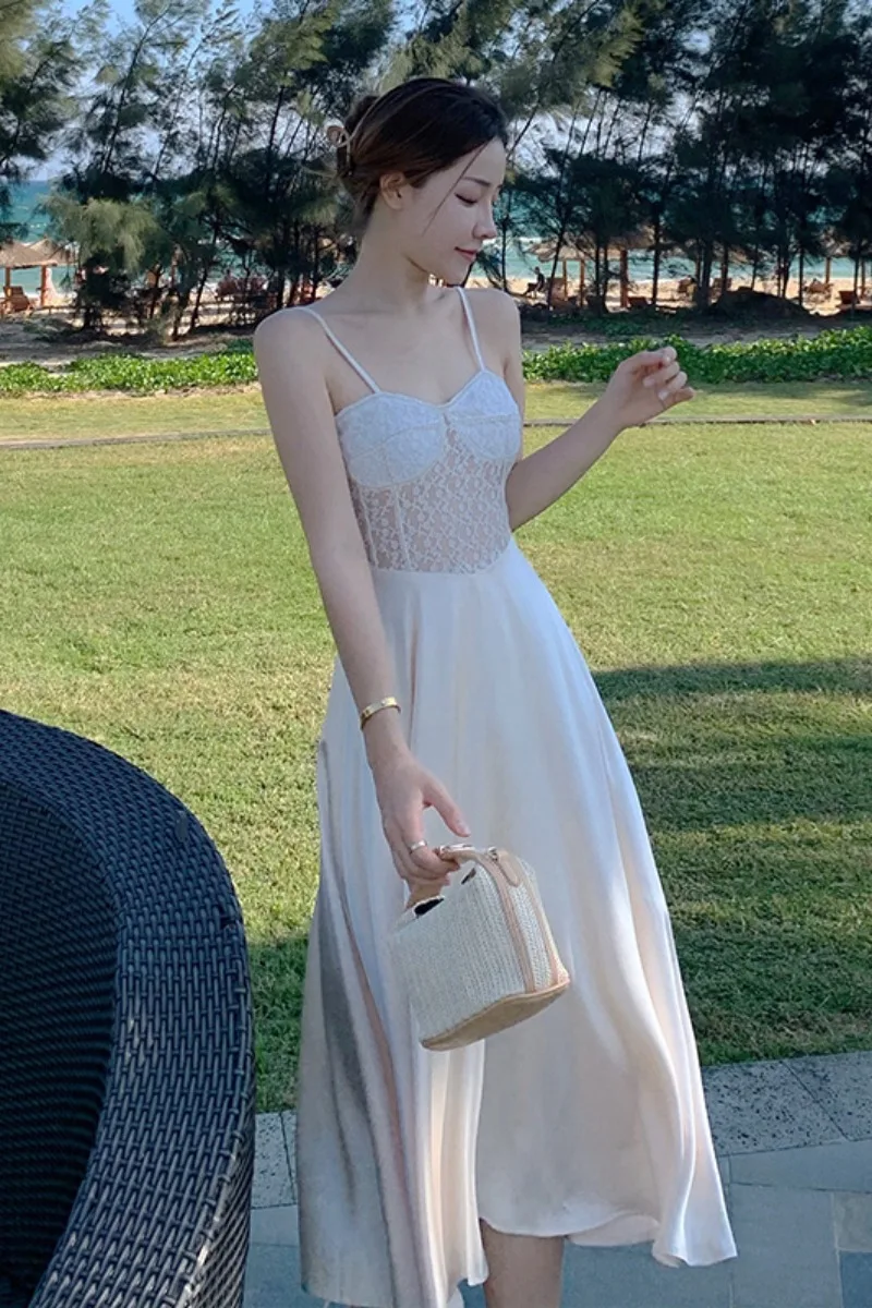 

French dress Hepburn temperament long skirt slim waist lace stitching sexy holiday suspender skirt women summer