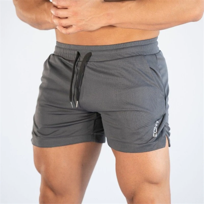 Medium grey Новые летние мужские шорты для фитнеса и бодибилдинга, дышащие быстросохнущие Модные Повседневные Шорты Для Бега 4XL, спортивная одежда - Цвет: Medium grey