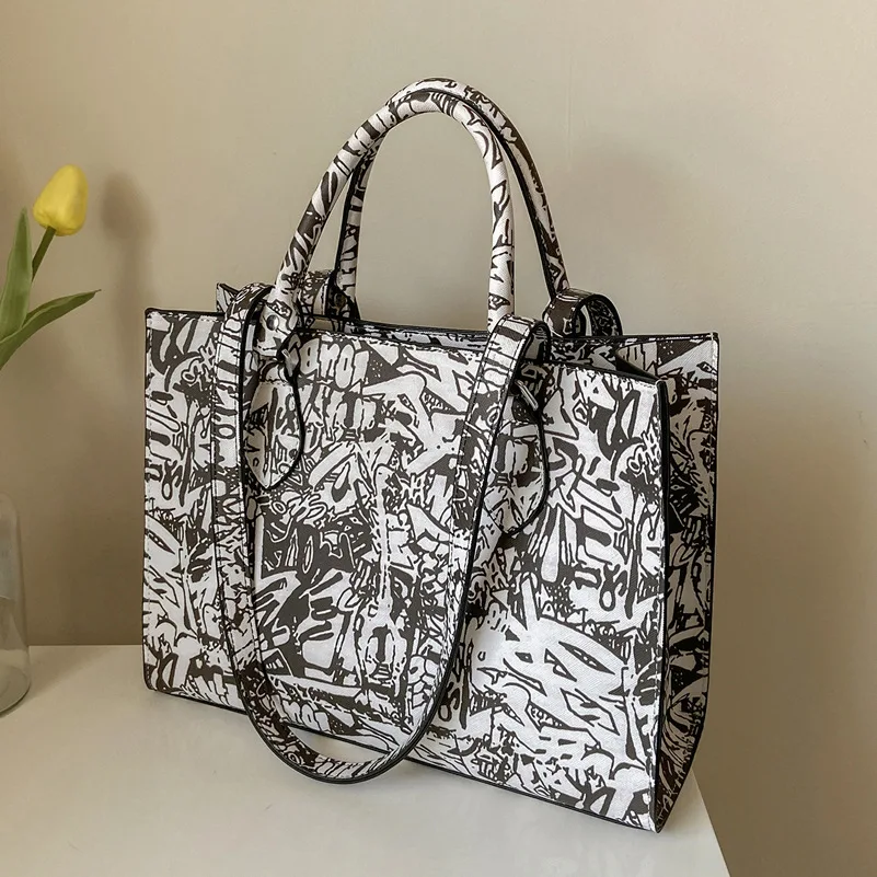 

European and American Women's Large-capacity Handbag 2021 New Student Big Bag OL Commuter Shoulder Bag Personality Graffiti Bag