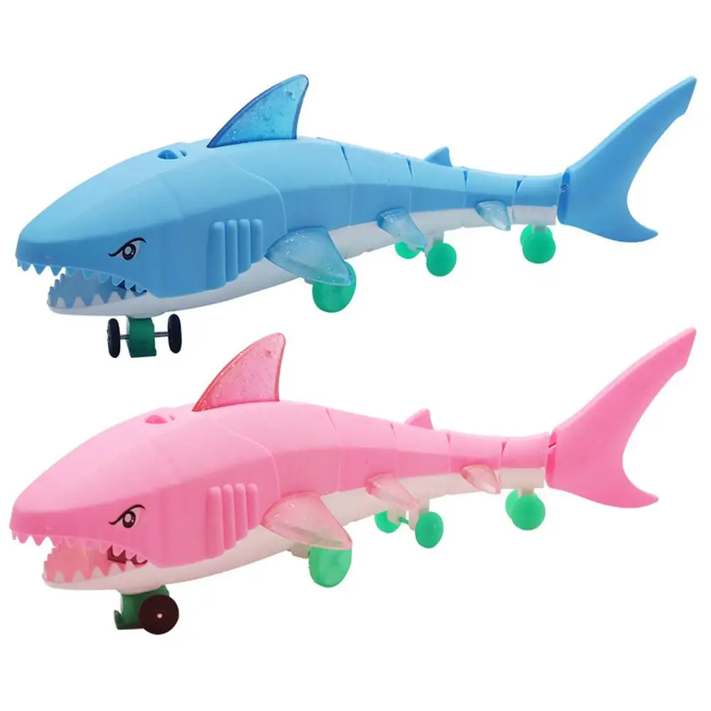 

Electric Light Music LED Shark Toy Air Glow Fish rolling wheel Shark toys Illuminate Kids Toys birthday gift