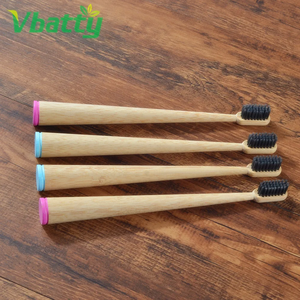 

Adults Conical toothbrush with colored bamboo charcoal bristles that can stand upright Adults Random-Color