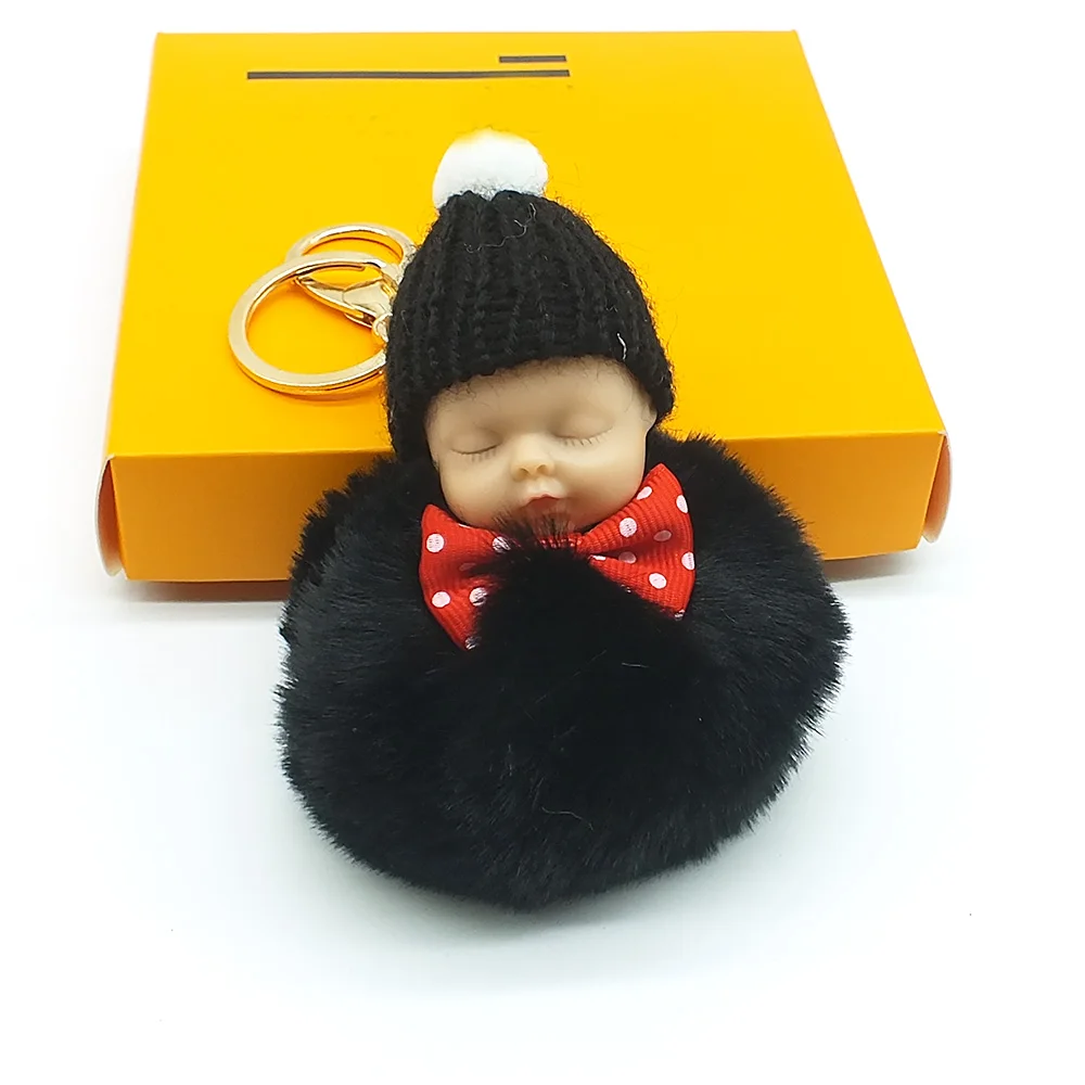 Женский брелок с помпоном и кроличьим мехом бантиком кукольный для ключей
