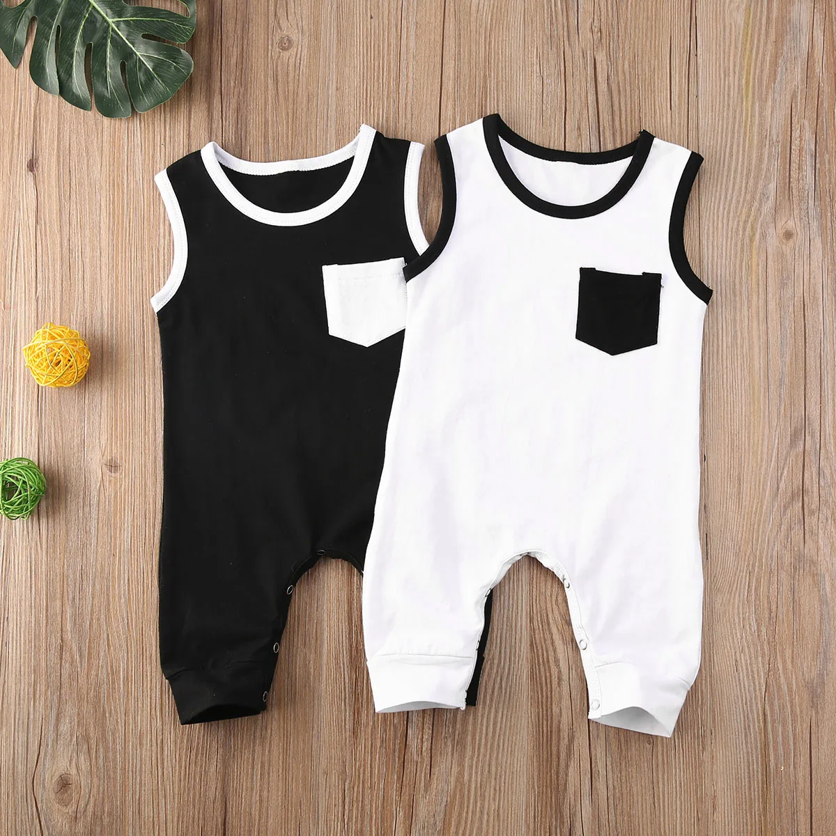 

0-18M Newborn Infant Baby Girls Boys Rompers Pocket Solid Sleeveless Cotton Jumpsuits Clothes 2 Colors 2020