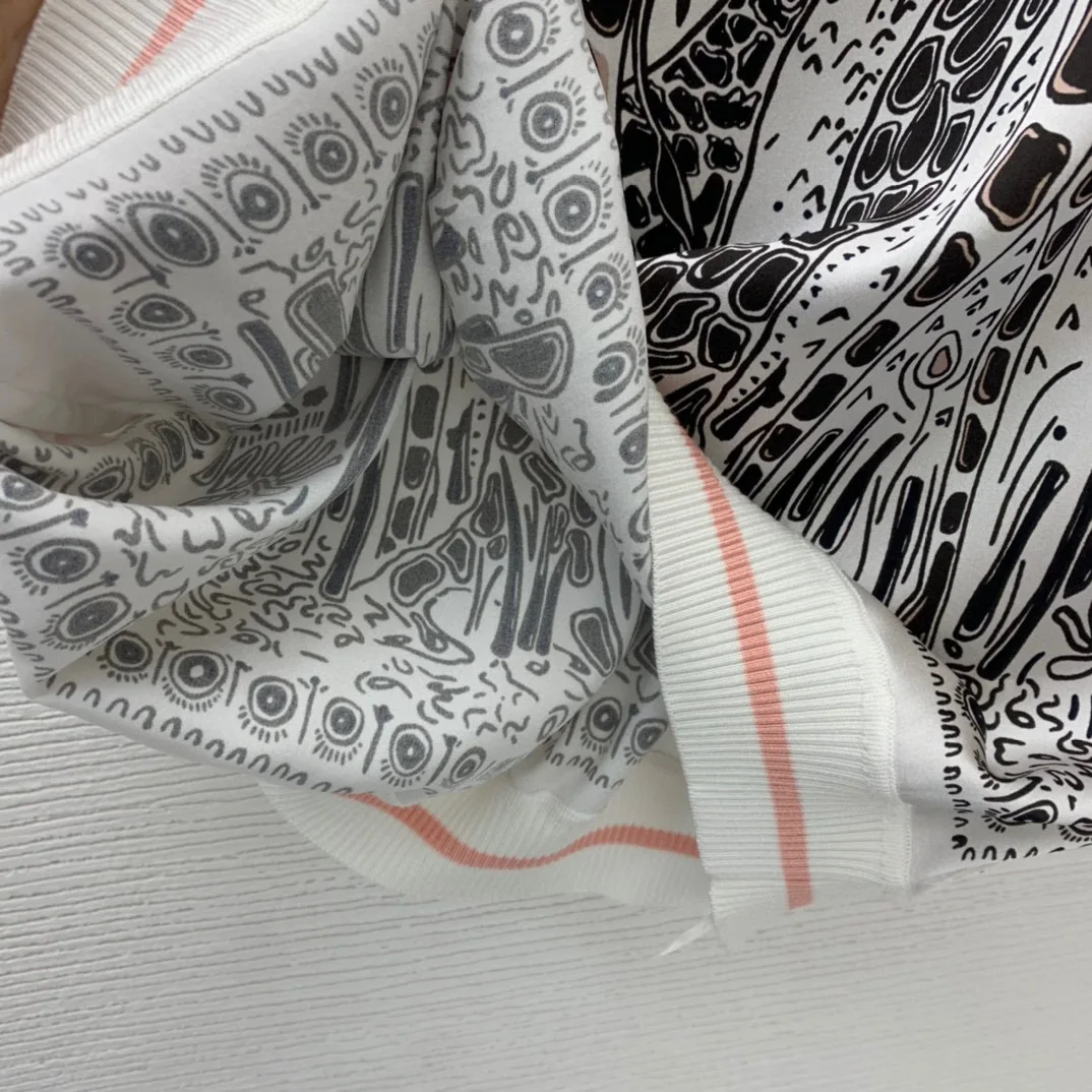 

High-quality fashion women's tops and T-shirts. Runway. Luxury European style design. Short version. Party style women