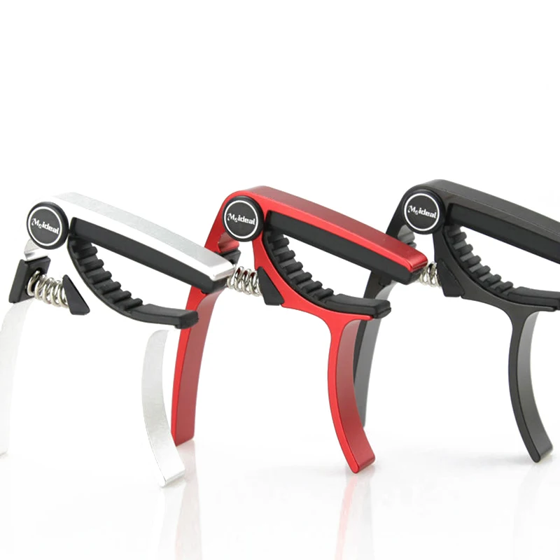 

Meideal укулеле каподастр из алюминиевого сплава предназначен для 4-струнного укулеле Изысканная пружина для использования одной рукой безопа...