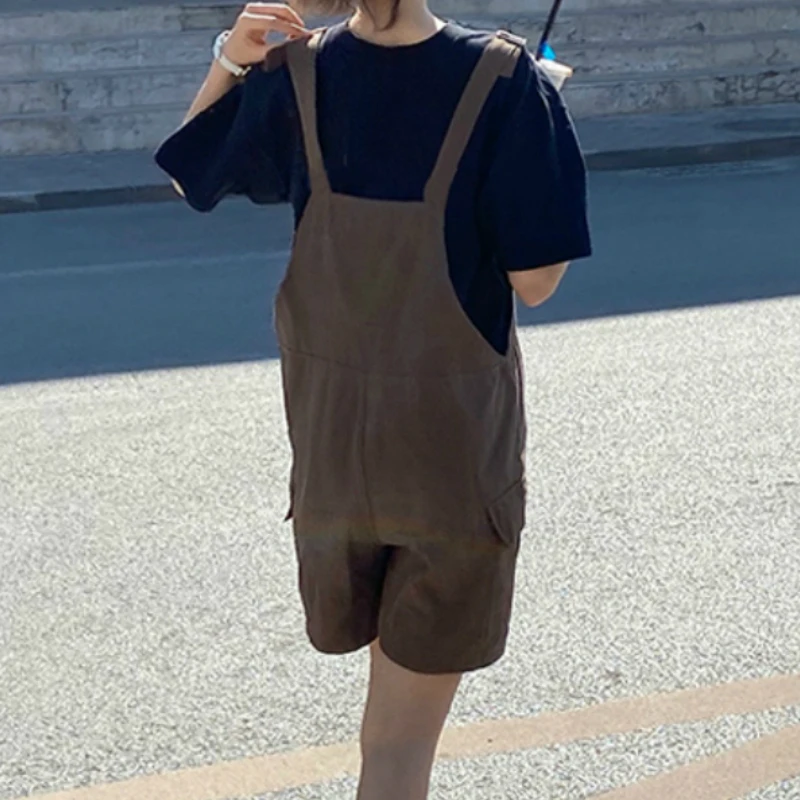 Комбинезон женский однотонный с широкими штанинами карманами |