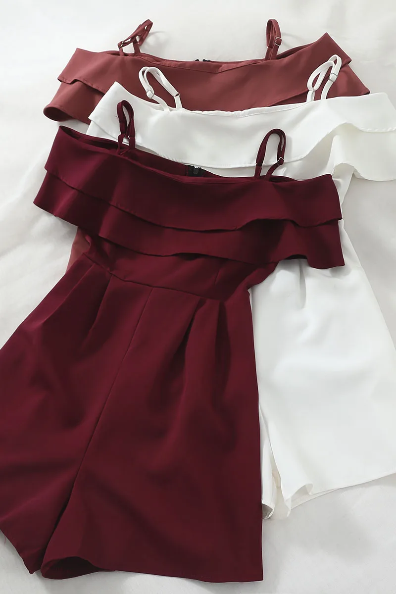 

Loose-fitting neckline suspenders with adjustable elastic waist and wide-leg jumpsuit