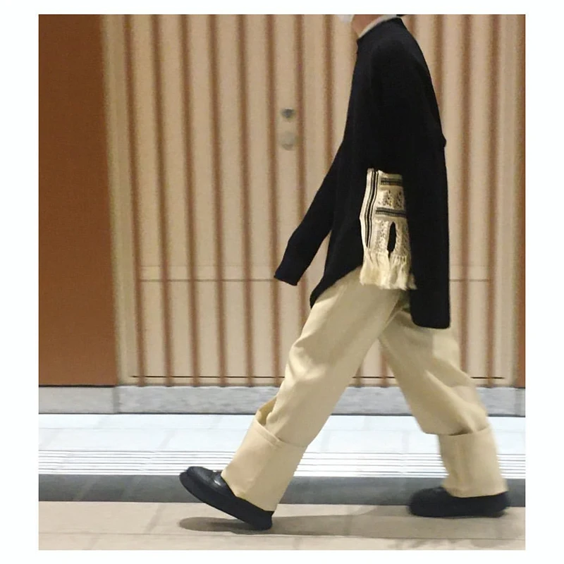 

British casual street style woven tassel stitching open sleeve knitwear men's and women's black round neck sweater coat