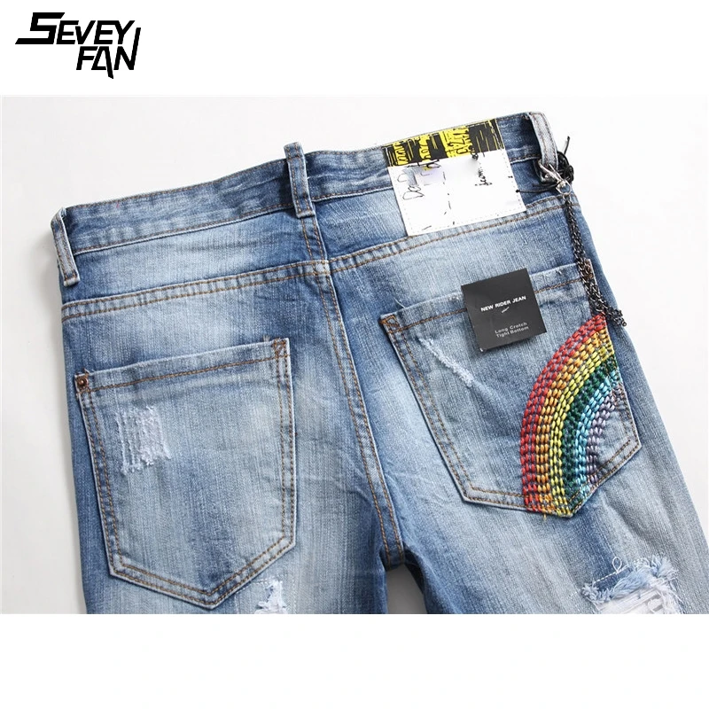 

Mens Blue Skinny Jeans Hole Fashion Chain Brand Denim Pants Hip Hop Destroy Distressed Tassel Streetwear Slim Jean Trousers Male