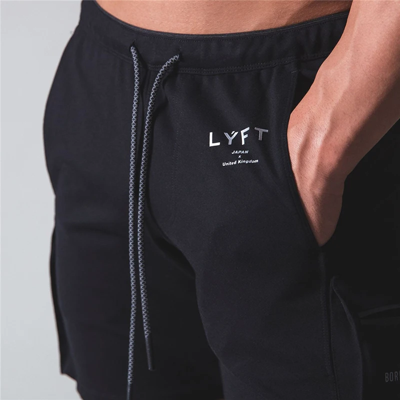 

2021 Summer Outdoor Jogging Men's Sports Shorts Two Color Splicing Fashion Fitness Training Shorts Moisture Wicking Shorts