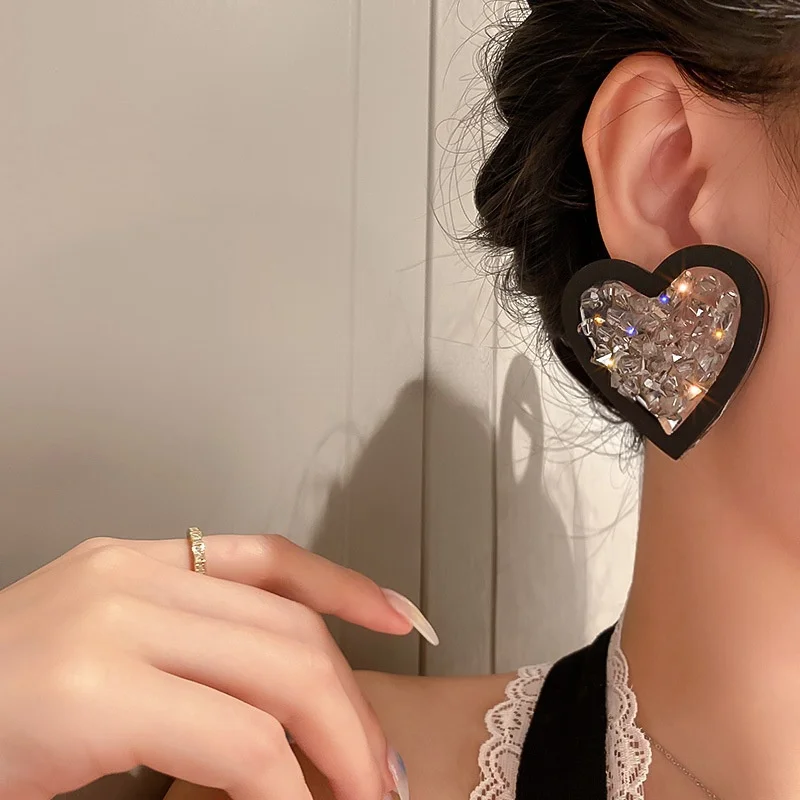 

Женские серьги из серебра 925 пробы с черными кристаллами