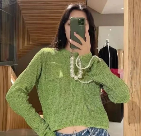 

Женский трикотажный свитер с круглым вырезом, с карманами