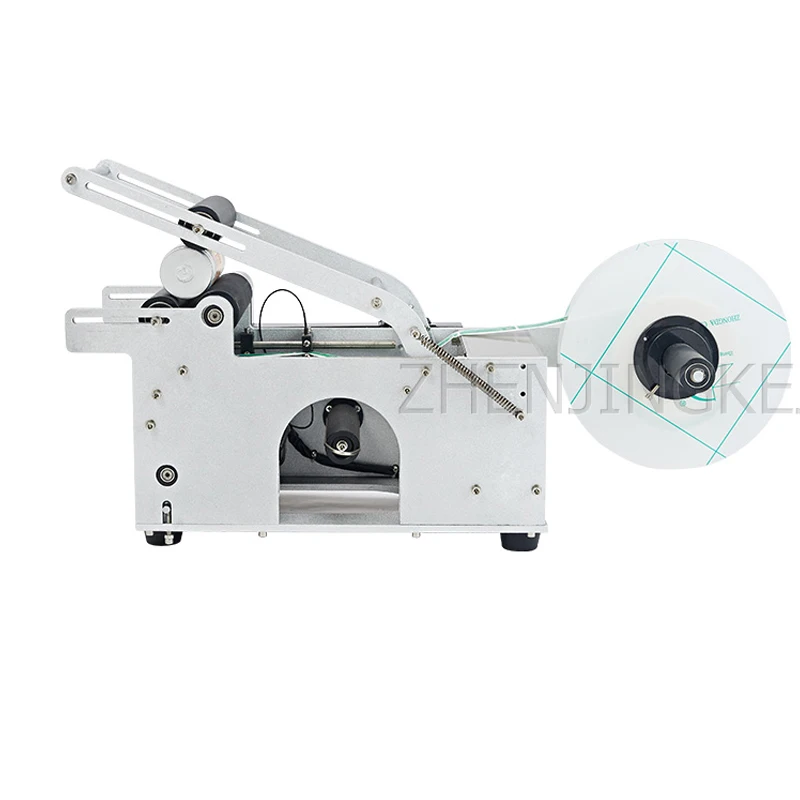 

Semiautomatic Round Bottle Labeling Machine Trademark Labeling Machine Manual High Precision Labeling Machin Machining Center