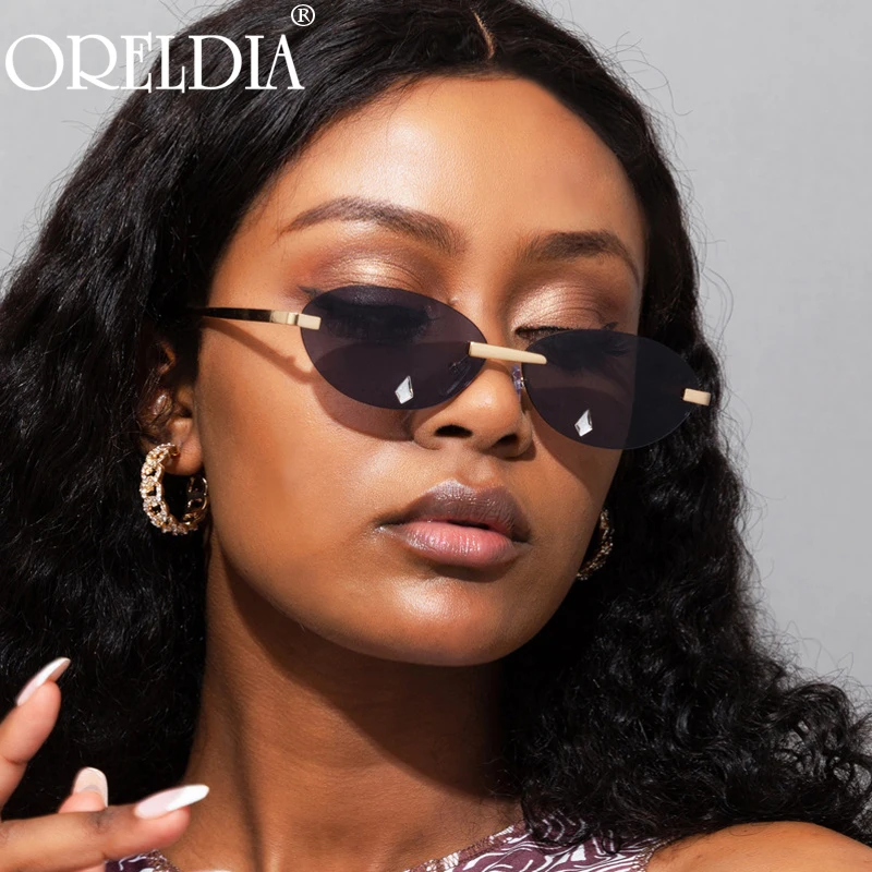 

Fashion Rimless Oval Sunglasses New Women Men Rhinestone Sun Glasses Water Droplets Diamond Eyewear Lady Eyeglasses UV400 Oculos