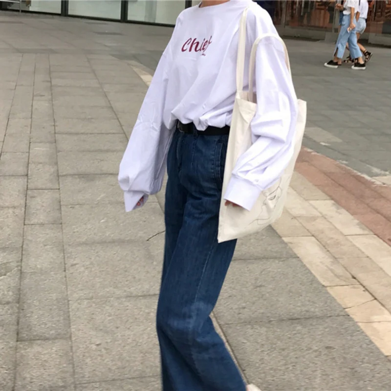 Женская свободная футболка с буквенным принтом белая Осенняя облегающая