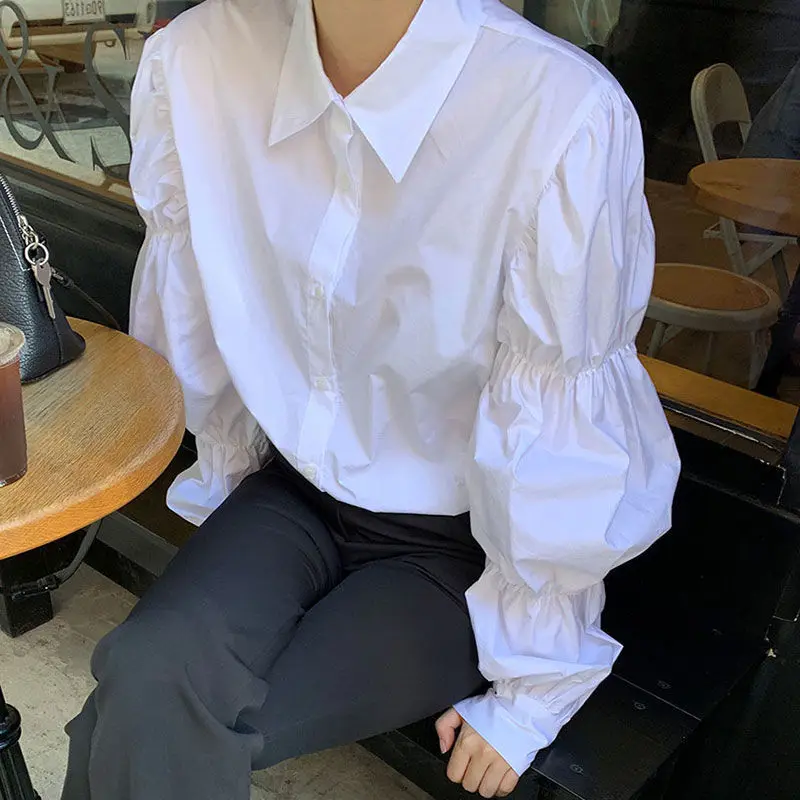 

South Korea Spring and Autumn Design Sense Age Reduction Bubble Sleeve Lapel Single-breasted Long Sleeve White Shirt Blouse