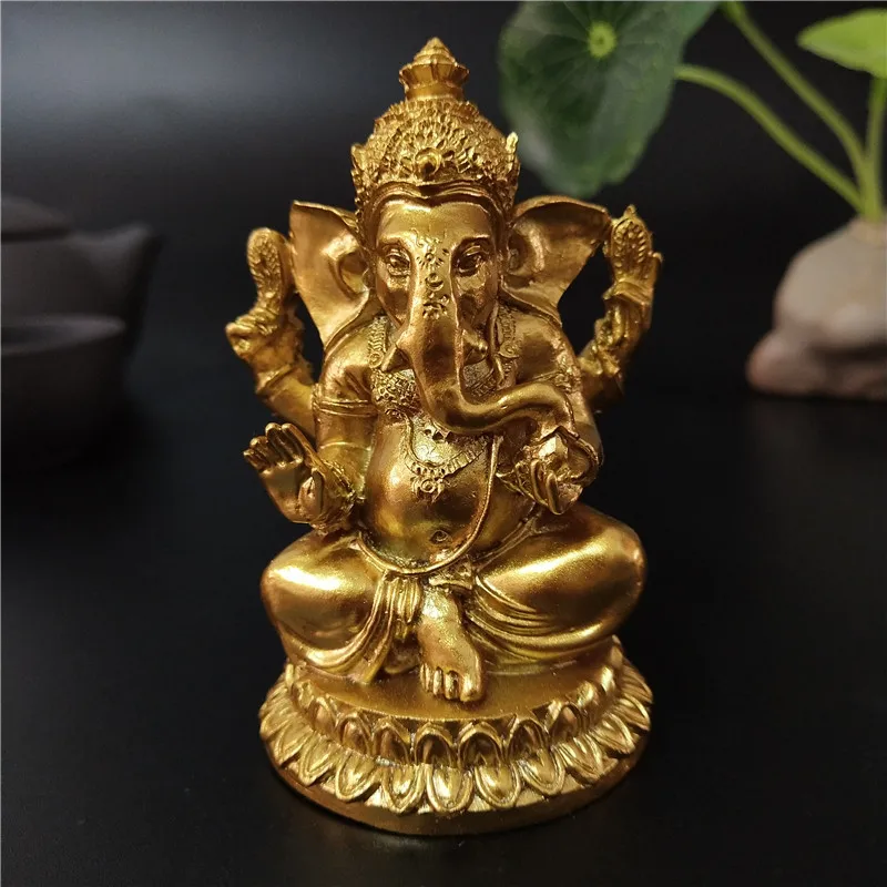 

Gold Lord Ganesha Statue Buddha Elephant hindu God Sculpture Figurines Resin Home Garden Decoration Buddha Statues For House