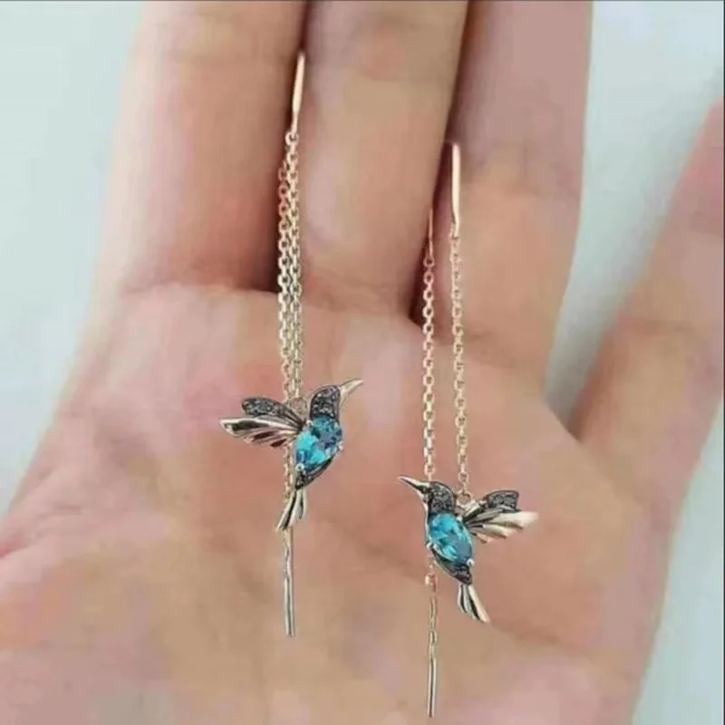 

Hot-selling red mixed winged bird earrings earrings earrings fashion simple and versatile student gifts