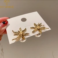 xiyanike gold color eight pointed star flower pearl for women alloy earrings 2021 trend party gift fashion jewelry pendientes