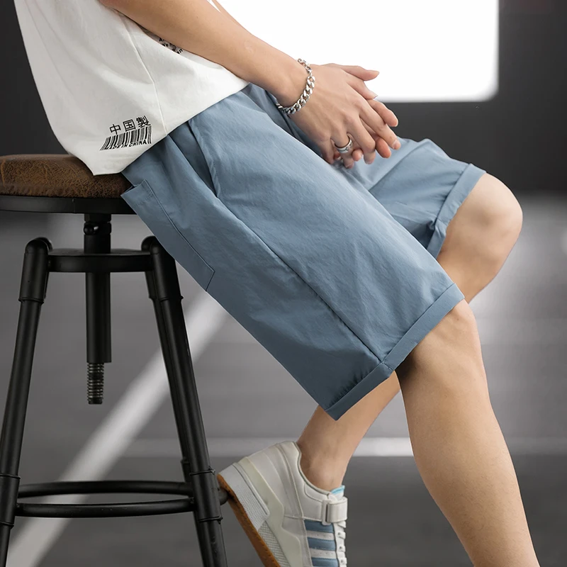 

Shorts men's summer Hong Kong Style thin loose casual ice silk pants leisure sports pants college students pants big boy