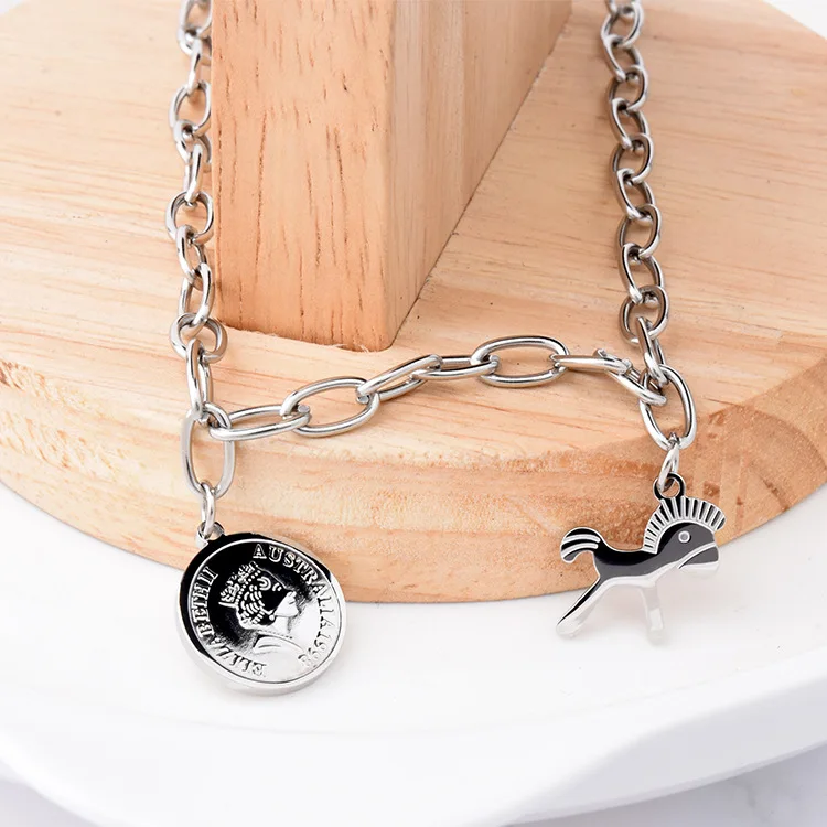 

Fashion mid-length sweater chain round brand pendant titanium steel men and women thick necklace jewelry hot sale