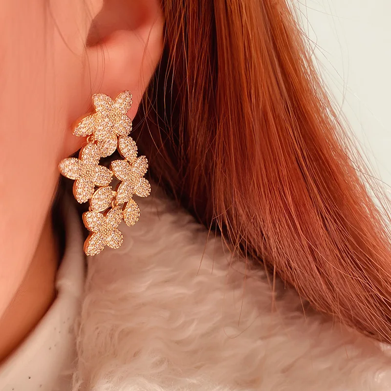 

Exaggerated flower earrings temperament studded full diamond dress party earrings luxury temperament zircon fairy earrings