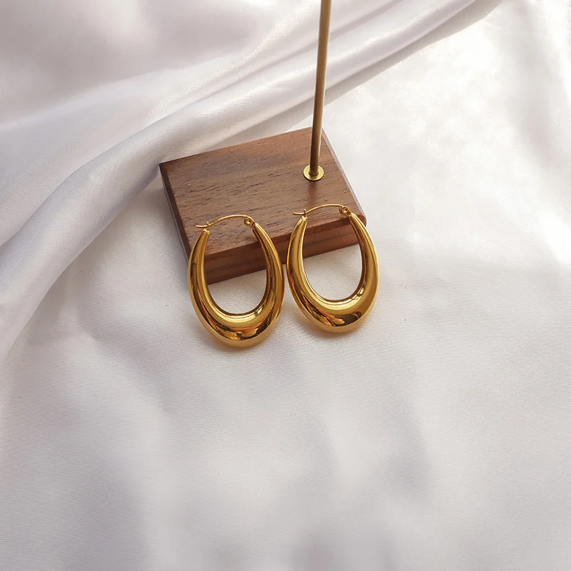 Неустаревающий чудо-титана вырез овальные шпильки серьги ювелирные изделия из