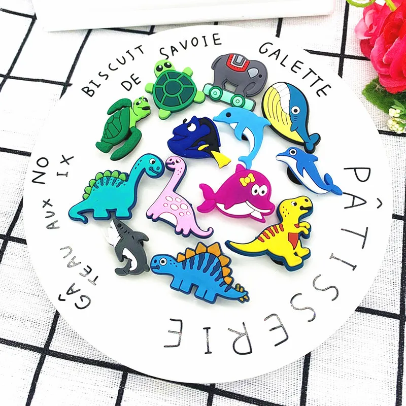Hot 1pcs High quality PVC Shoe Charms DIY funny Dinosaur Decorations Shoe Aceessories Fit croc Clogs jibz Kids X-mas party Gifts