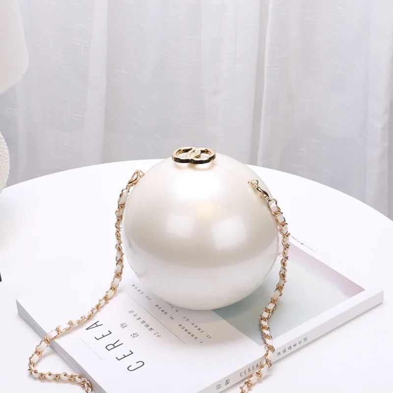 

ANOKHOGI 2020 All New Fashion Evening Bag Pearl Circular Style Women Shoulder Bag Metal Twist Chains Handbag ZX69